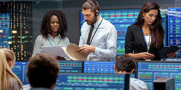 People at work in the trading office.